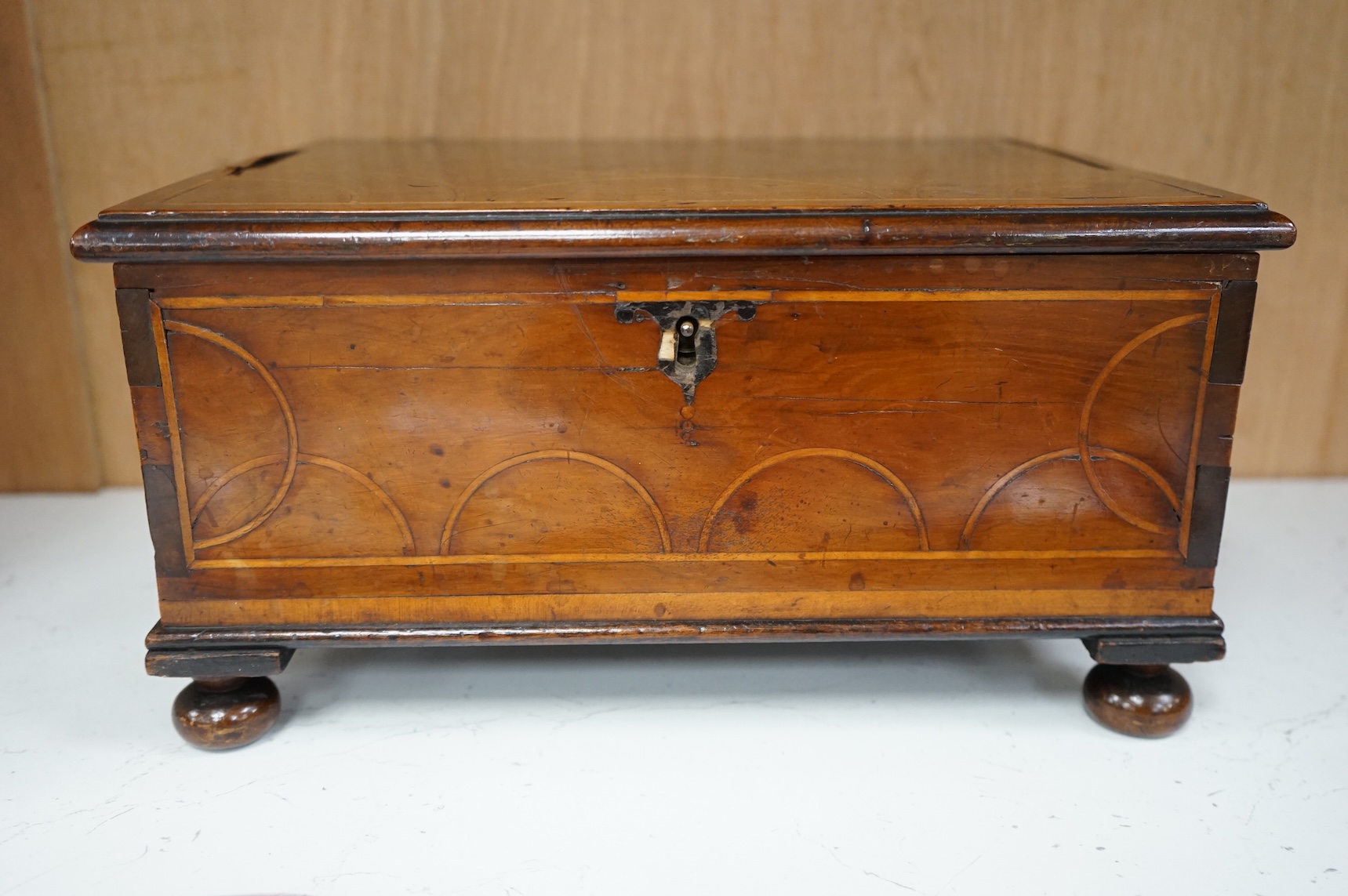 A William III yew wood and line inlaid bible box, some later alterations, with key, 34cm wide